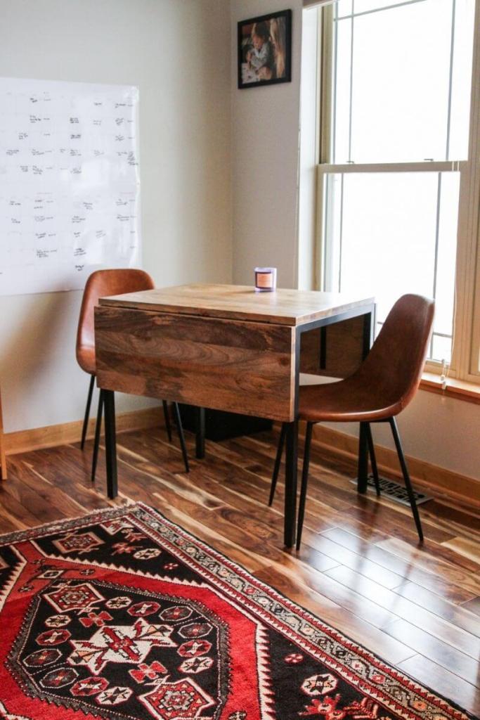 Wooden table and leather chairs for home office 